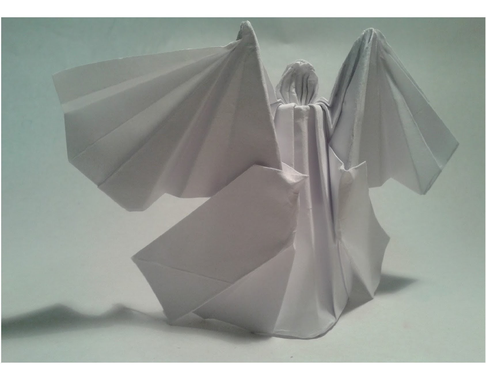 Como hacer un ángel de origami