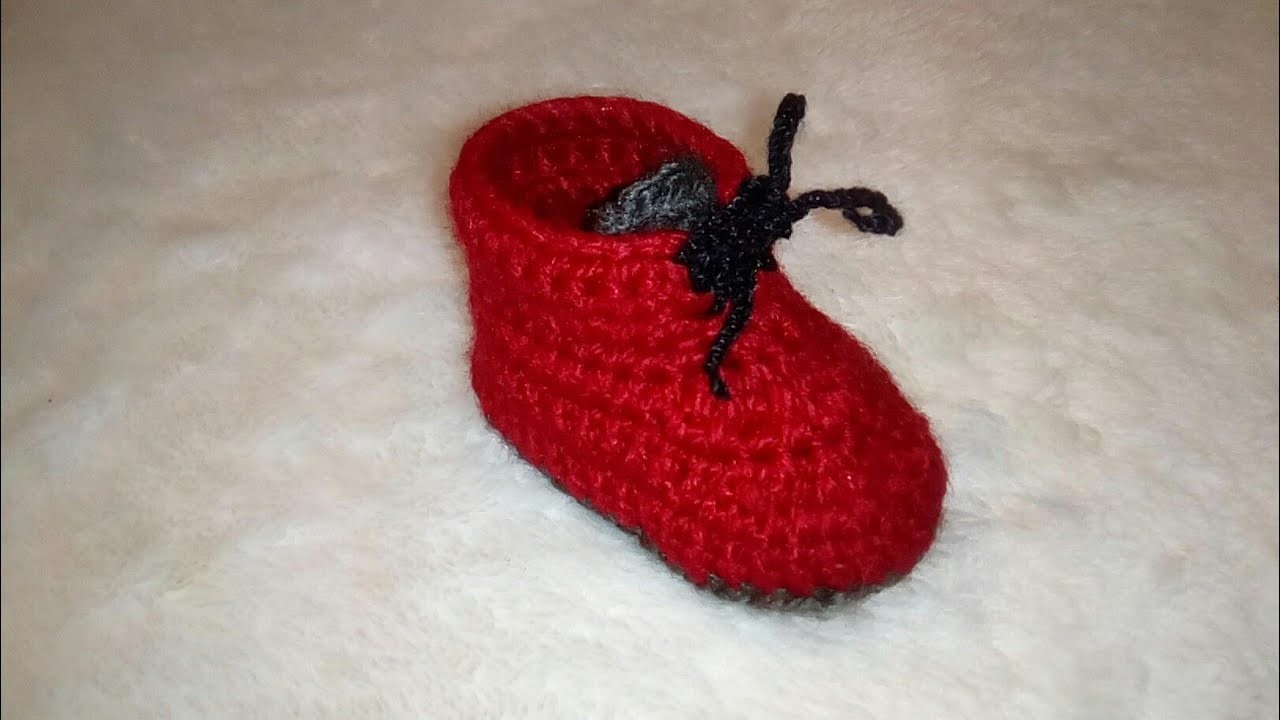 Zapato.botita de bebé tejido