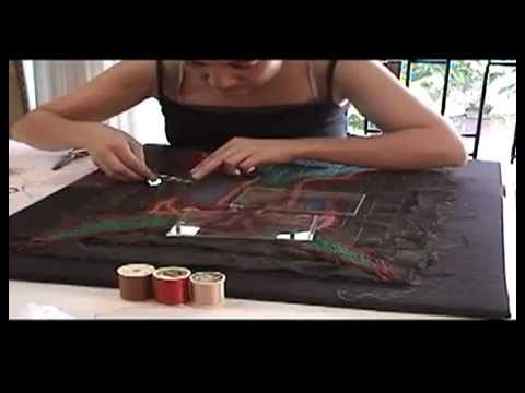 Restauración Arpillera Violeta Parra