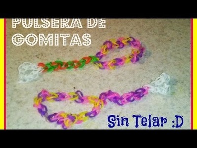 Como hacer un pulsera anillo de gomitas sencillo