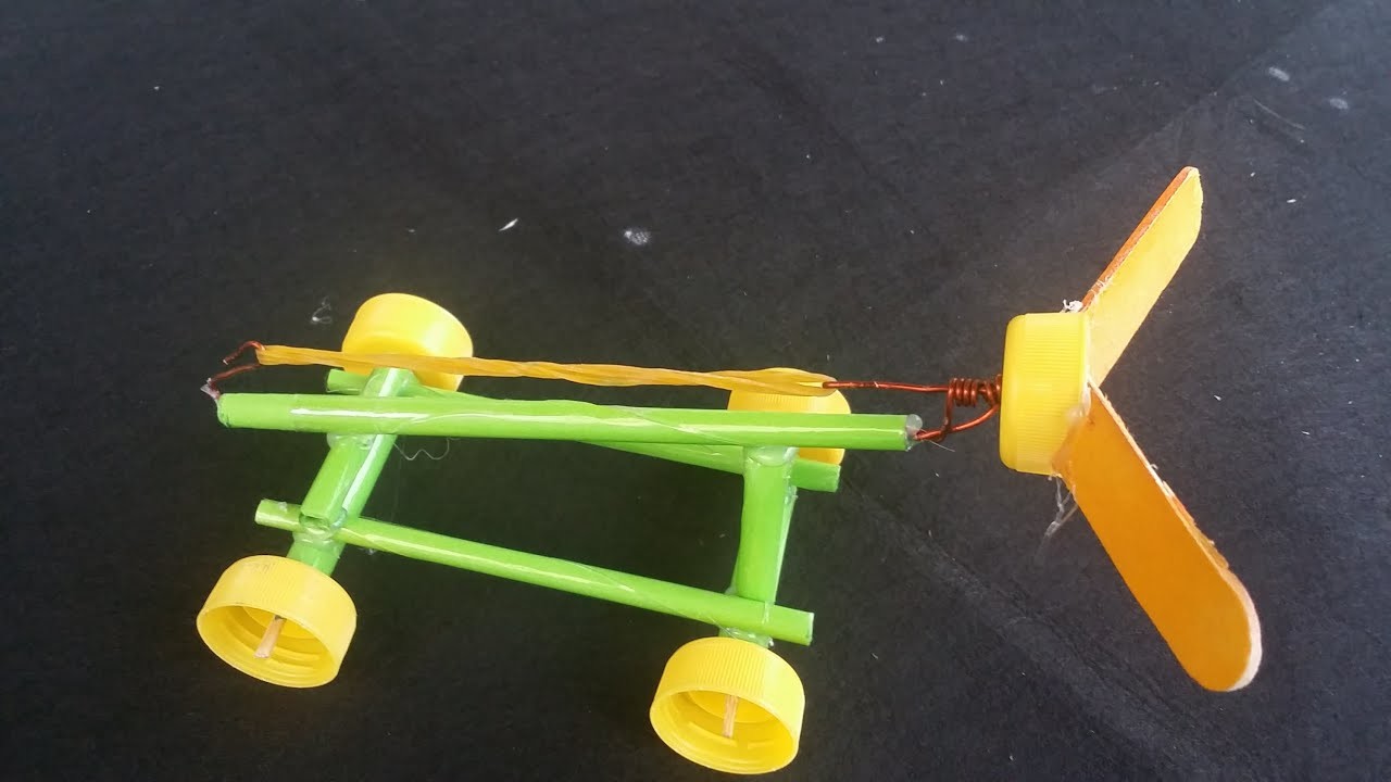 Como hacer un auto propulsado con goma | coche de papel
