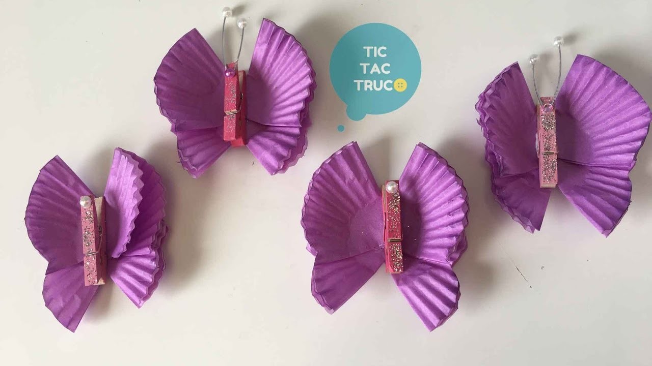 Pinzas decoradas de mariposa con papel