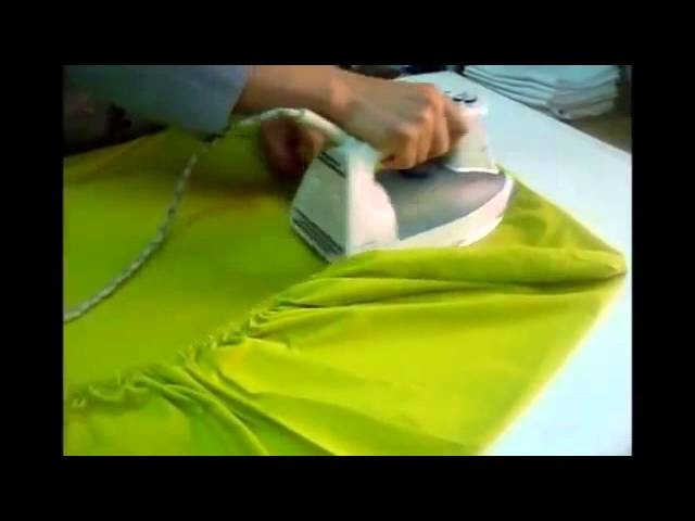 Cómo doblar y planchar una sábana ajustable