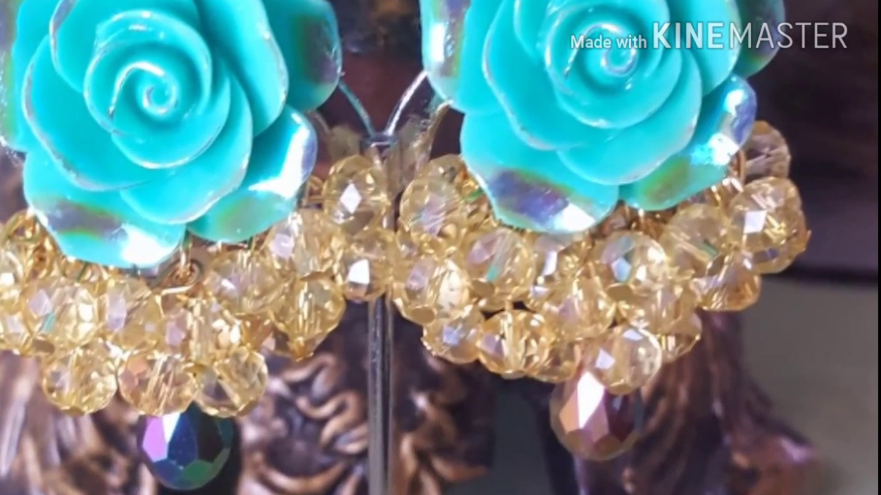 Arete azul turqueza con dorado.byMildredHidalgo