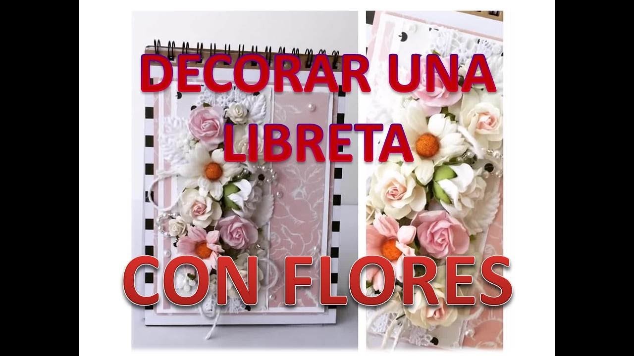 Decorar las tapas de una libreta con flores.