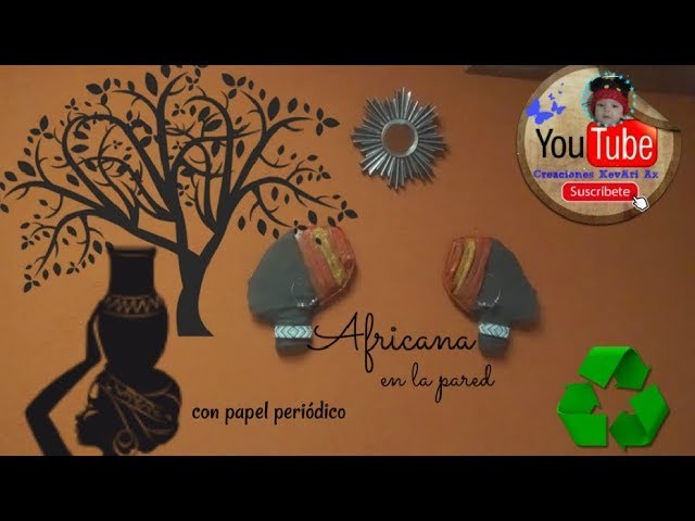 Africana en la pared hecha con papel periódico.DIY Reciclaje.African with news paper
