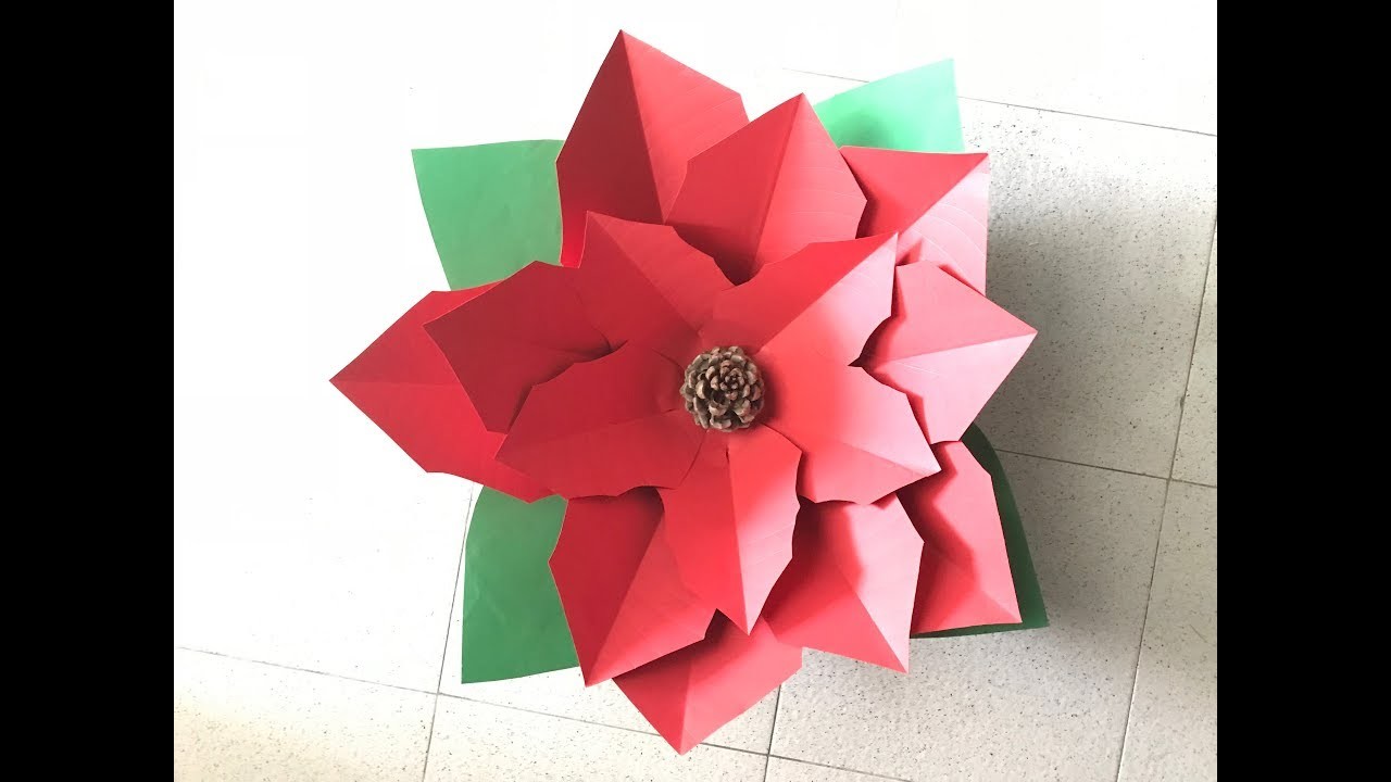 Flor de navidad o Ponsetia hecha en cartulina Christmas flower made on paper