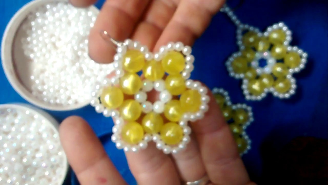Como hacer flor con perlas