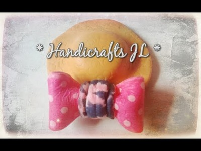 Moño de pasta con técnica decoupage. Cold porcelain bow with decoupage technique