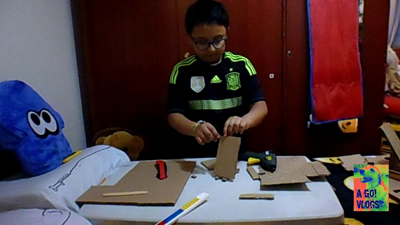 Manualidades.Reciclado PORTACELULAR