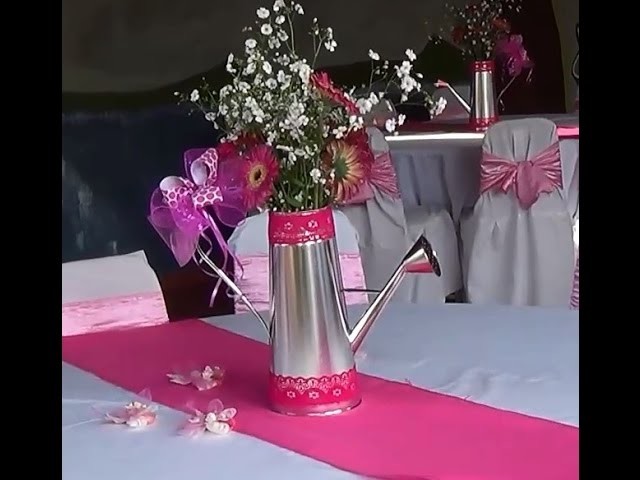 Centro de mesa  Regadera con Flores.