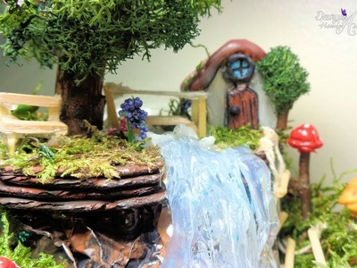 Fairy garden in a fishbowl.  Jardín dentro de una pecera