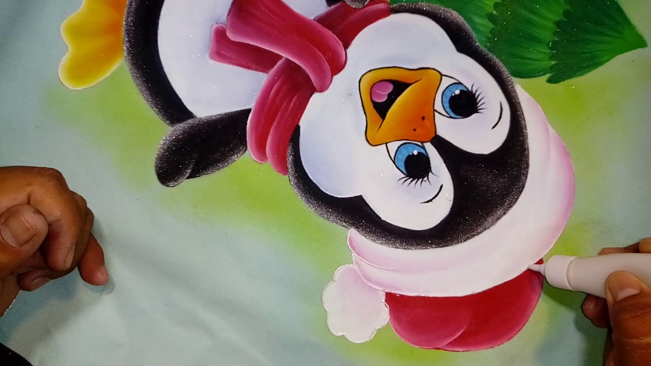 Pintando ojos y decorando pingüino con Alfre Severo.