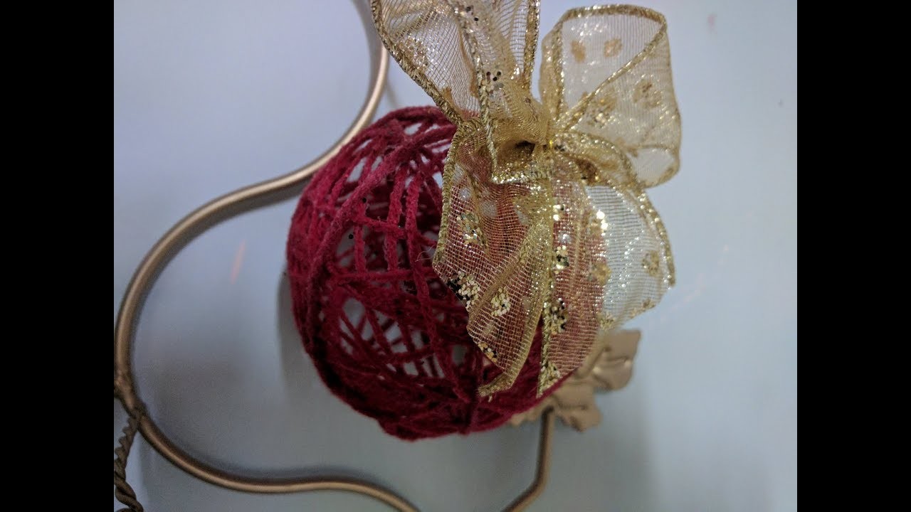 DIY Esfera navideña con sobrantes de hilo