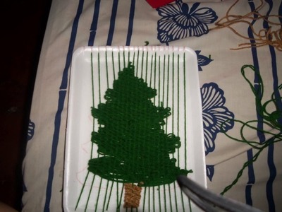 Arbolito de navidad hecho en telar decorativo