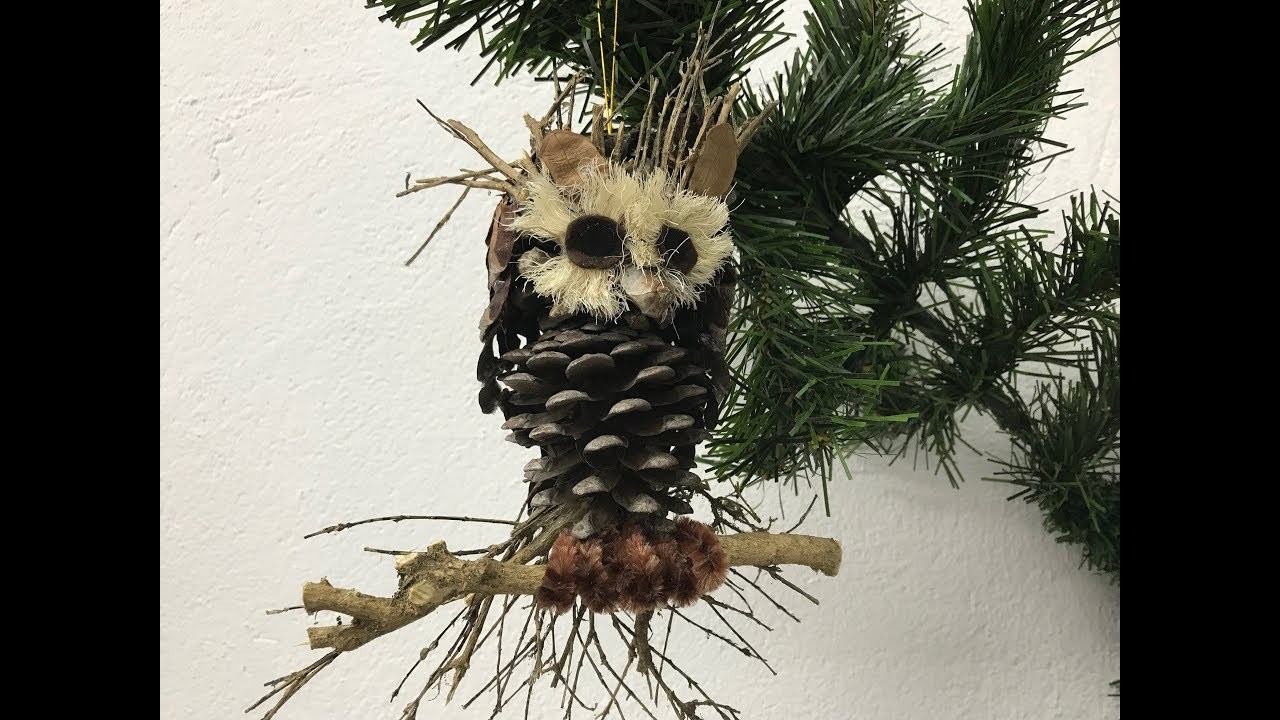 Búho hecho con piñas de pino Owl made with pine cones