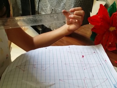 Como hacer flores navideñas en papel crepe ( parte 1 )