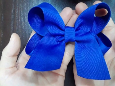 Como hacer un moño boutique con puntas. | How to make a boutique hair bow from grossgrain ribbon