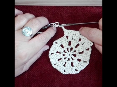 Mantel individual o centro de mesa a crochet Flor de 9 pétalos.Parte 1.