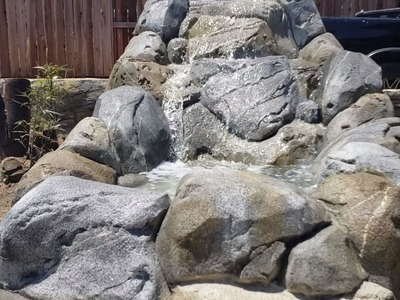 Cómo hacer una cascada imitación de piedras bolas usando cemento quebrado
