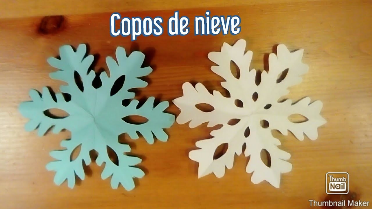 Como hacer copos de nieve ❄️ de cartulina, manualidades fáciles.