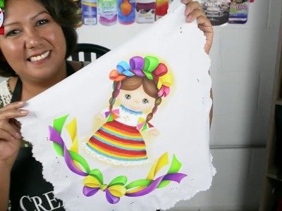 Pintando una muñeca mexicana en tela con la Mtra. Lydia Perez