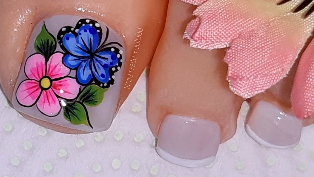 Decoración de uñas para PIE. decoración de uñas flor y mariposa. diseño para pies. uñas de los pies