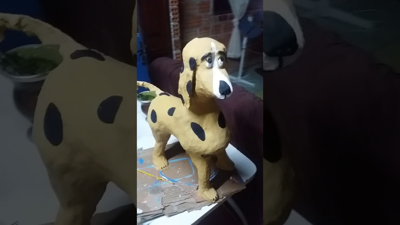 Cachorro de artesanato de cimento