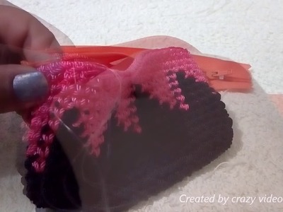 Monedero a crochet con grecas triangulares