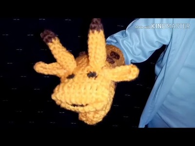 Títere de jirafita, en forma de guante tejido a crochet.
