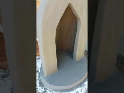 Acabamento final da capelinha acendedor de de vela artesanato de cimento e areia