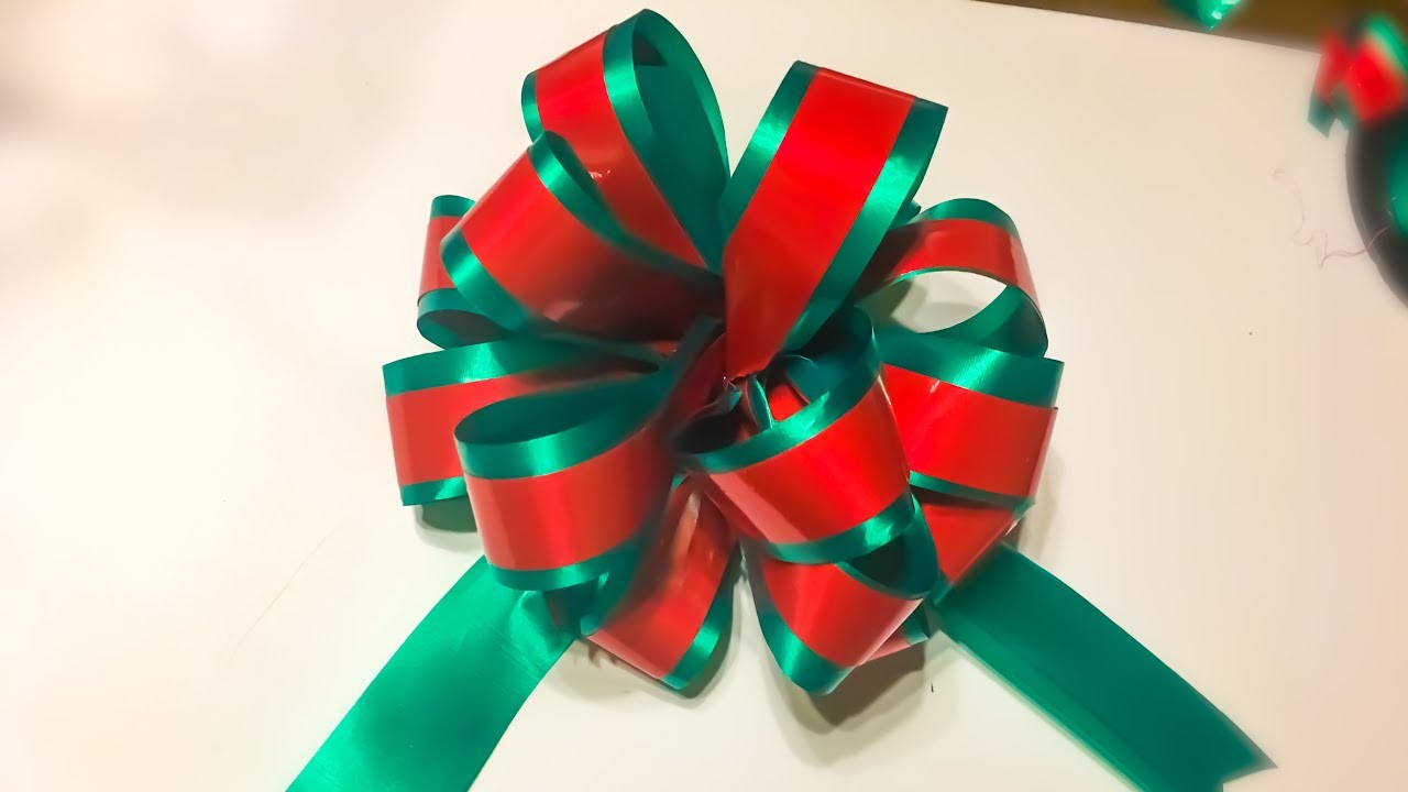 Cómo hacer Moños navideños tipo pom pom. How to make a Christmas Puffy bow