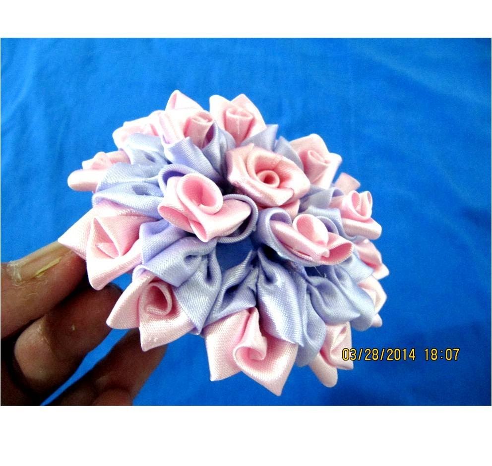 Flores rosas lilas kanzashi en cintas para el cabello
