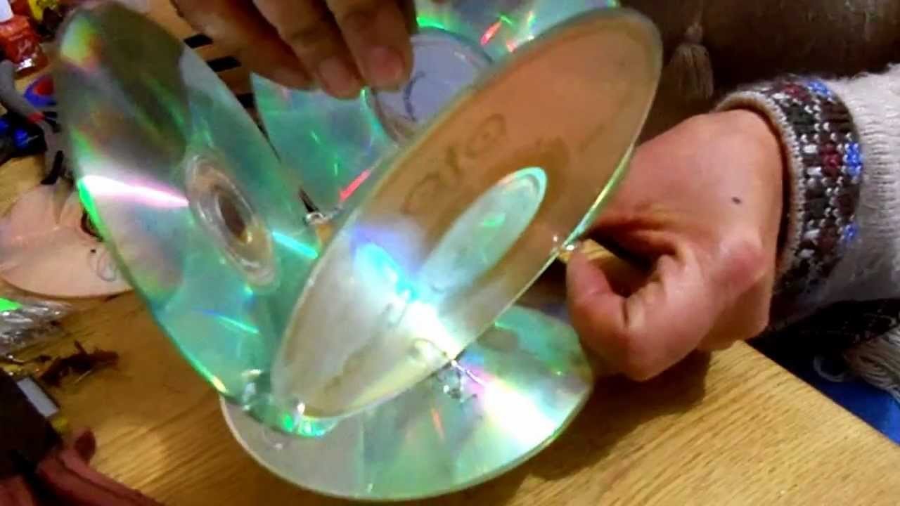 Portavela de CD reciclado.