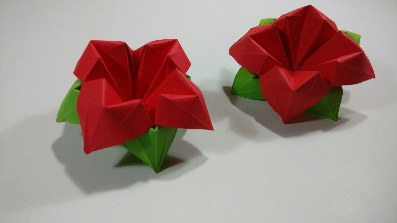 Como hacer una flor de papel de cuatro petalos
