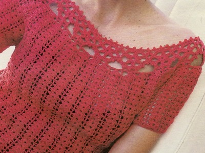 Blusa a crochet con rosetas