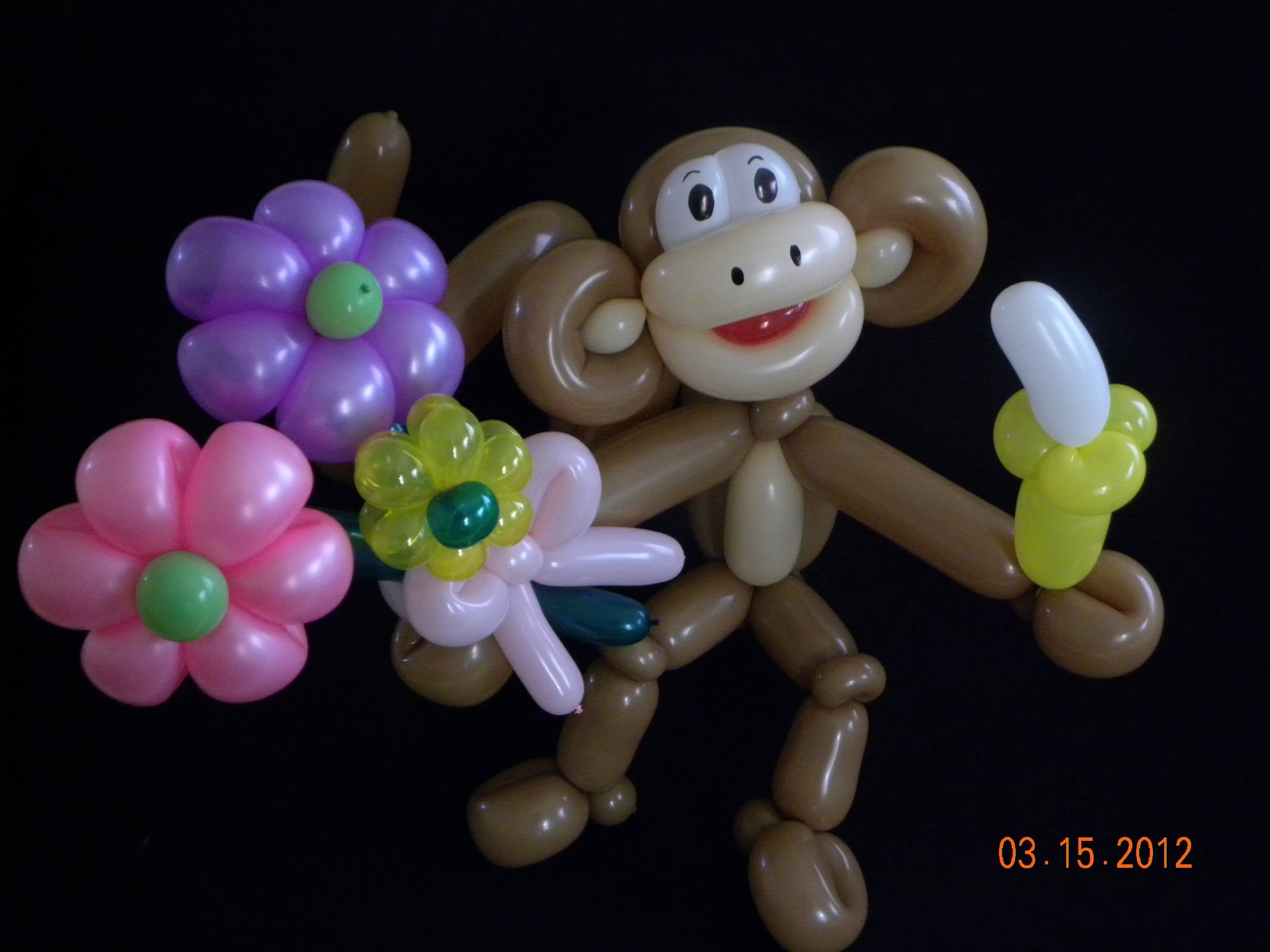 CHANGO CON FLORES.- MONKEY WITH FLOWERS .