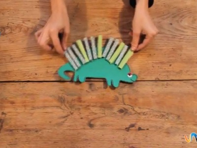 Hacer dinosaurio de papel con pinzas