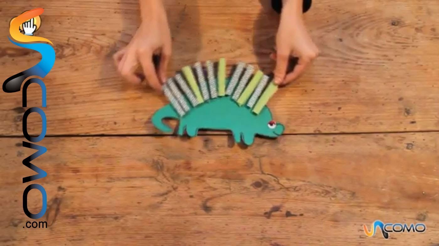 Hacer dinosaurio de papel con pinzas