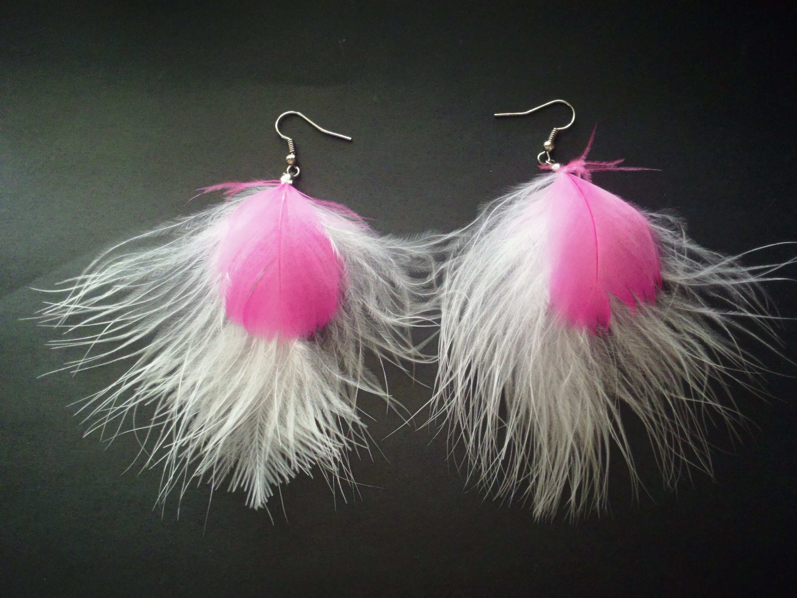 Aretes de plumas muy Fashion