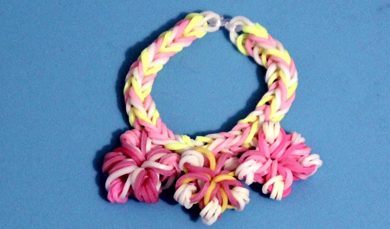 Cómo hacer pulsera con gomitas y flores. Flower rainbow loom bracelet