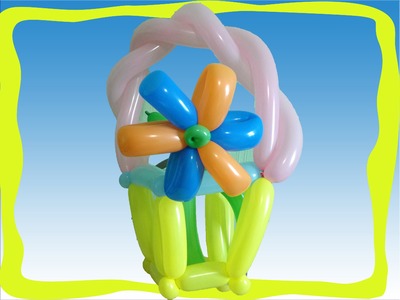 Canasta de globos con flores