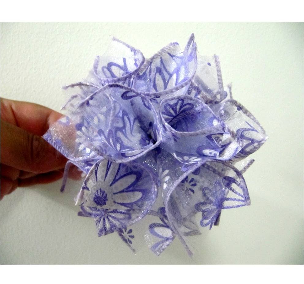 Moños flor pompones en cintas de organza para el cabello