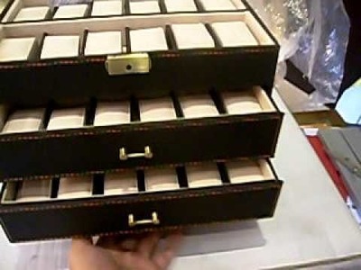 Caja para guardar relojes de 48unid con perfecto acabado y varios departamentos.