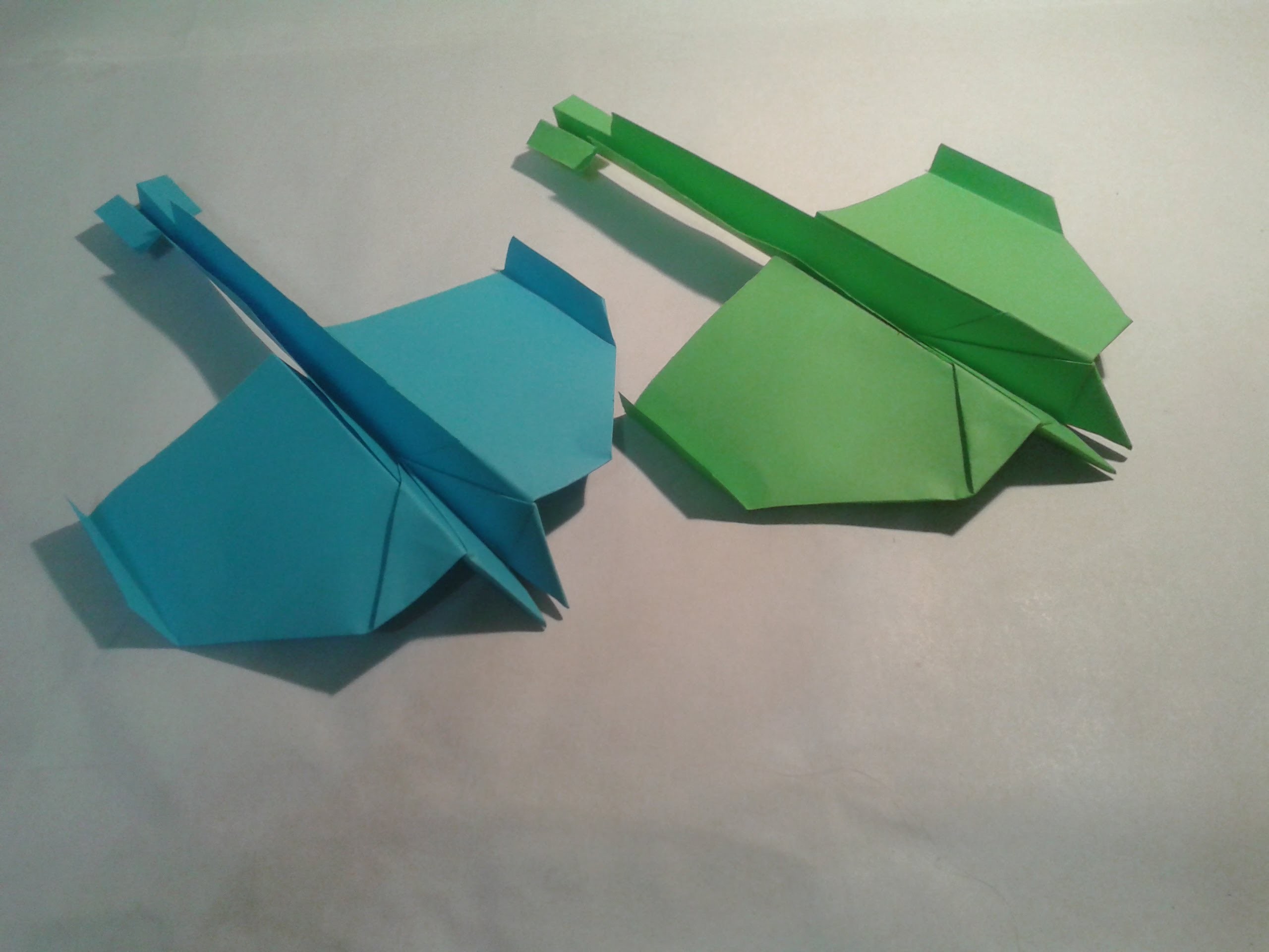 Como hacer un avion de papel planeador