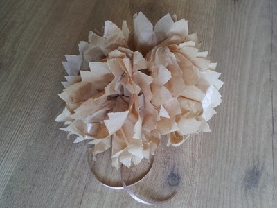Cómo hacer un pompón de papel en forma de flor | facilisimo.com