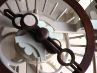 Reloj de madera péndulo de torsión