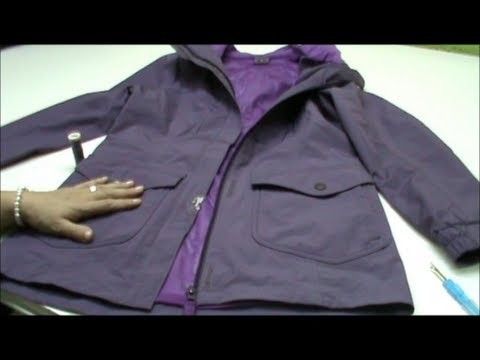 Cómo solucionar un roto en una chaqueta