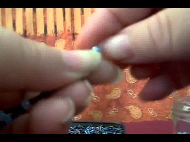 Cómo hacer un rosario hecho con canutillos y  chaquirones.