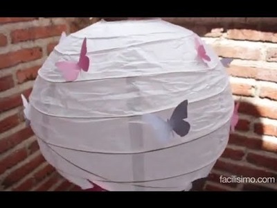 Cómo decorar un farolillo con mariposas | facilisimo.com